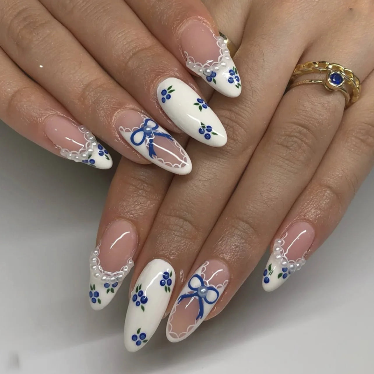 Matte Almond Nails with Elegant Rose Leaf Design