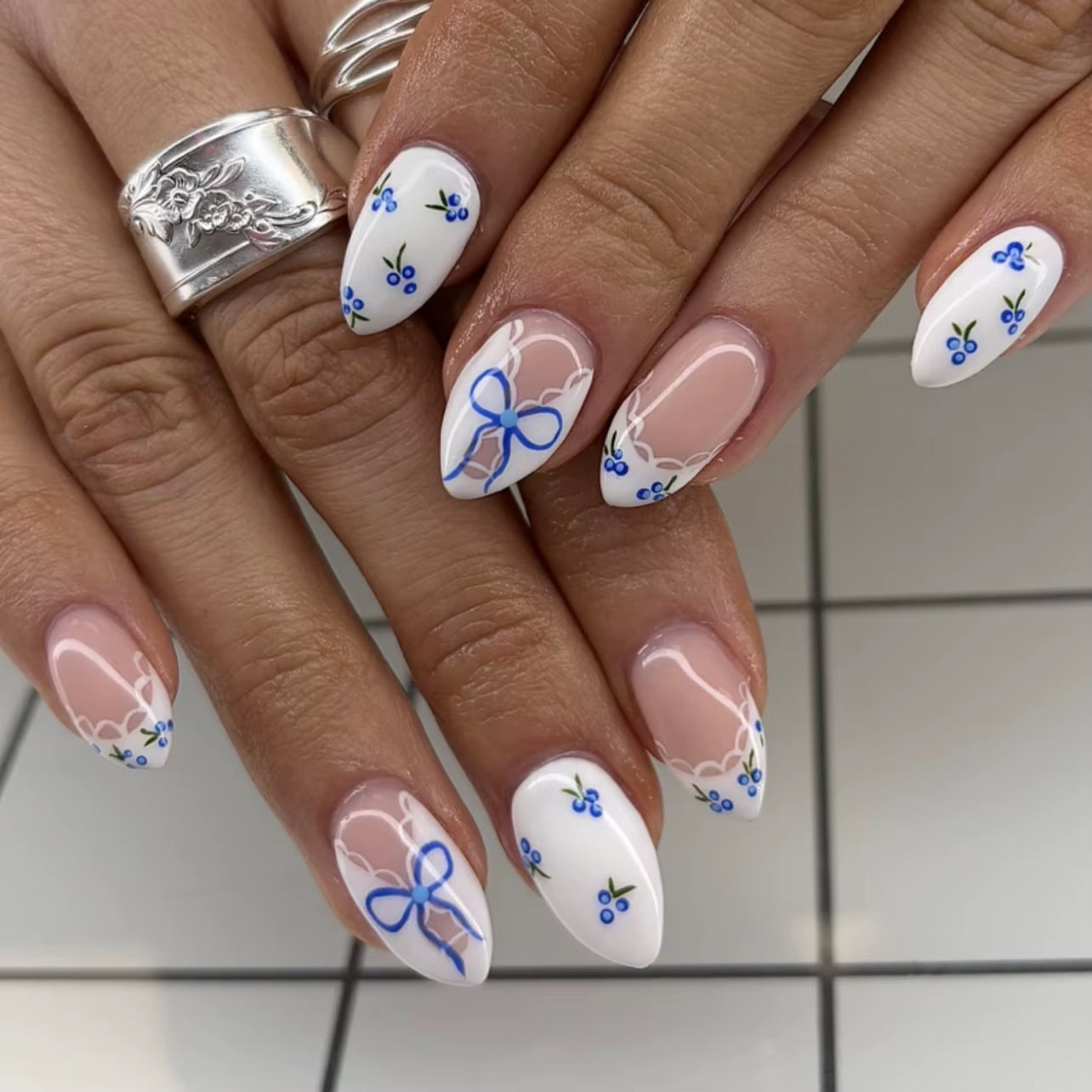 Matte Almond Nails with Elegant Rose Leaf Design