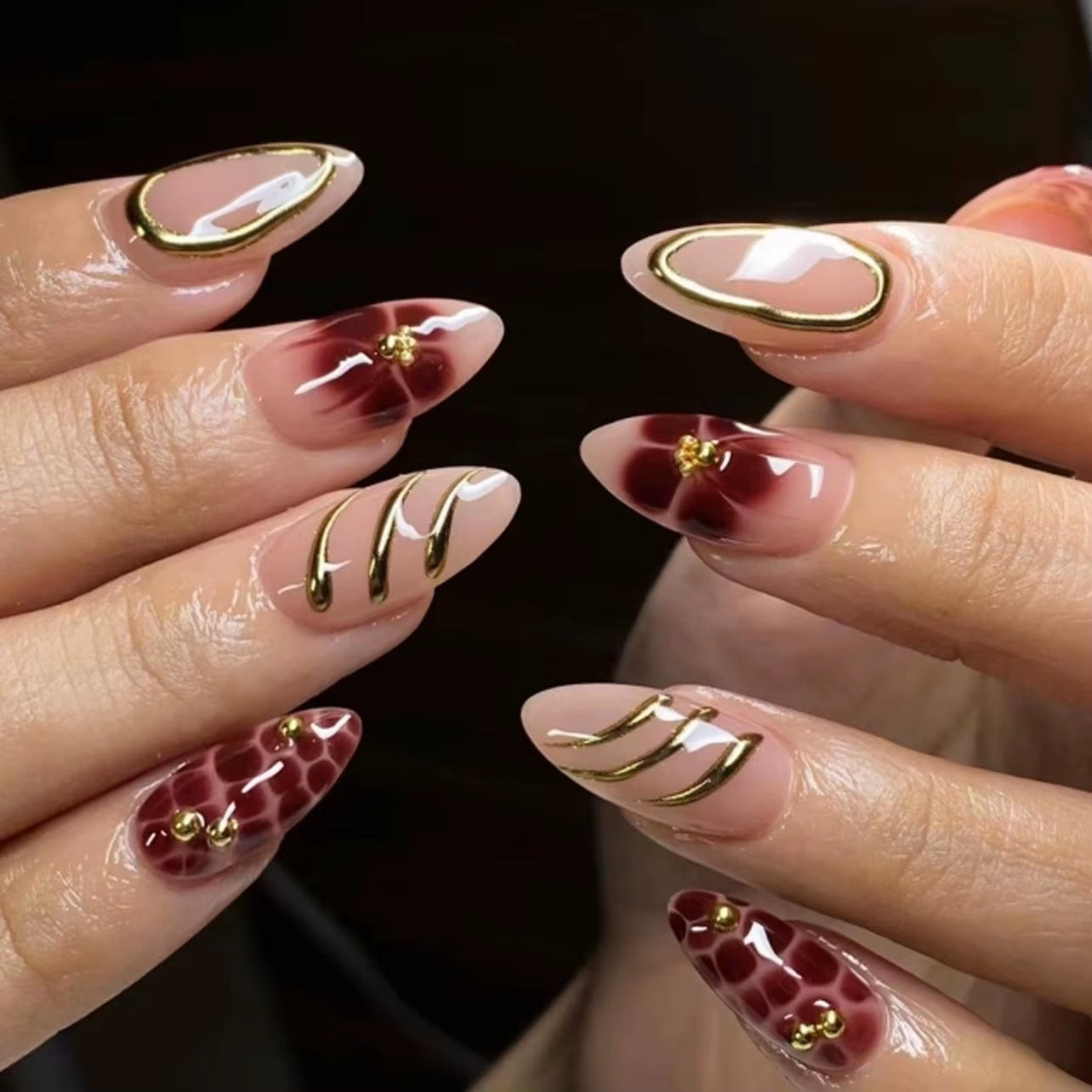 Matte Almond Nails with Elegant Rose Leaf Design